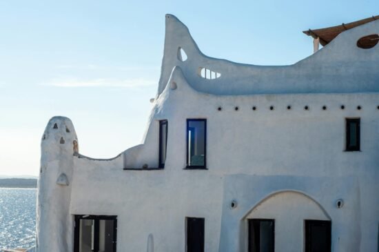 Unique whitewashed architecture of Casapueblo in Punta Ballena, Uruguay, overlooking the sea.